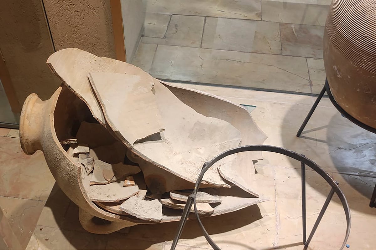 AP : This undated image provided by the Hecht Museum of the University of Haifa shows a rare bronze-era jar that was accidentally smashed by a four-year-old child during a visit in the museum in Haifa, Israel 

